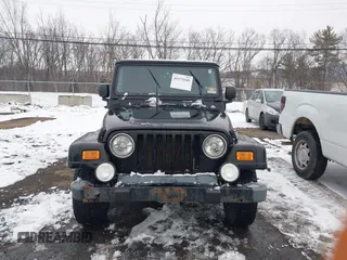 2005 Jeep Wrangler X with VIN 1J4FA39S55P353131, listed as a IAAI auction lot 41575949 with 154,026 mi miles and . Bid and sale history available at DreamBid. Image 12.
