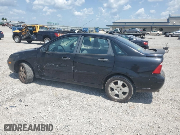 2006 Ford Focus S with VIN 1FAFP34N76W246035, listed as a Copart auction lot 61985015 with 196,498 mi miles and Salvage title. Bid and sale history available at DreamBid. Image 2.