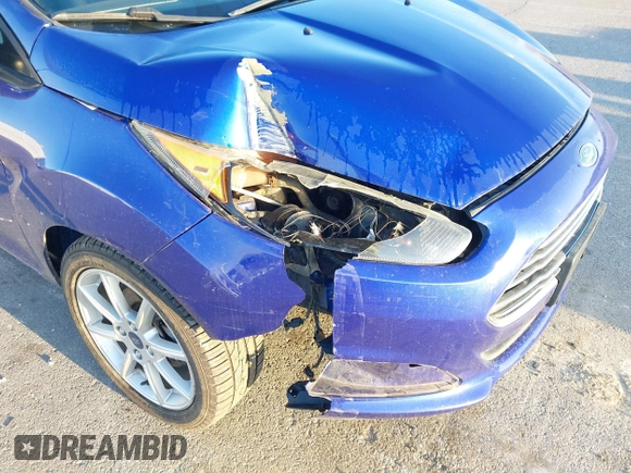 2014 Ford Fiesta SE z VIN 3FADP4BJ5EM243551, wystawiony jako IAAI lot #41919239 z przebiegiem 92 396 mil mil oraz . Historia ofert i sprzedaży dostępna na DreamBid. Obrazek 6.