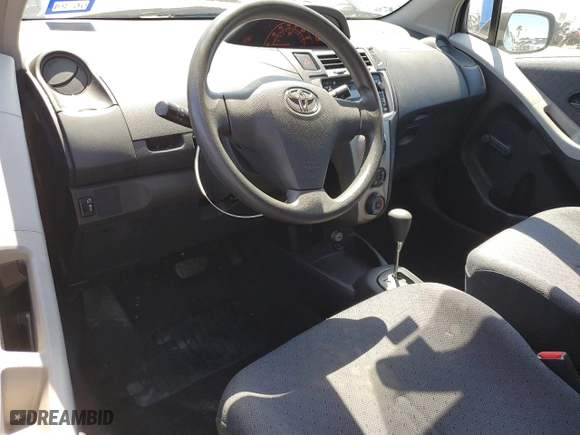 2009 Toyota Yaris with VIN JTDJT903995238147, listed as a Copart auction lot 52369925 with 124,921 mi miles and Salvage Title. Bid and sale history available at carsss.com. Image 8.