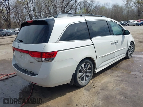 2014 Honda Odyssey Touring с VIN 5FNRL5H94EB057681, выставлен на аукционе IAAI как лот 41828000 с пробегом 249 350 миль миль и . История ставок и продаж доступна на DreamBid. Изображение 4.