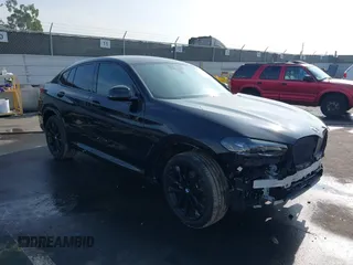 2023 BMW X4 xDrive30i with VIN 5UX33DT06P9T14070, listed as a IAAI auction lot 41175973 with 13,527 mi miles. Bid and sale history available at carsss.com. Image 1.