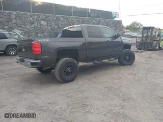 2014 Chevrolet Silverado 1500 LT with VIN 3GCUKREH4EG427604, listed as a IAAI auction lot 41403243 with 133,467 mi miles. Bid and sale history available at carsss.com. Image 4.