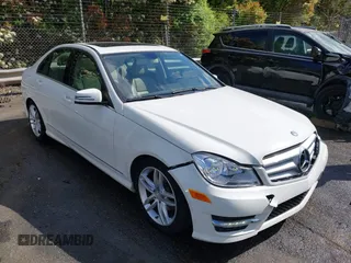 2012 Mercedes-Benz C with VIN WDDGF8BB9CR230328, listed as a IAAI auction lot 42024792 with 129,739 mi miles. Bid and sale history available at carsss.com. Image 1.