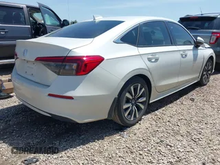 2023 Honda Civic EX with VIN 2HGFE1F76PH324177, listed as a IAAI auction lot 42253724 with 26,950 mi miles and . Bid and sale history available at DreamBid. Image 4.