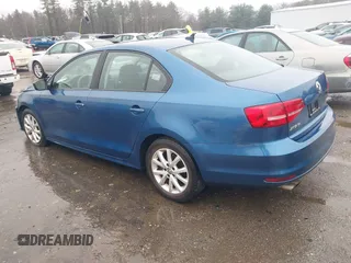 2015 Volkswagen Jetta Sedan 1.8T SE with VIN 3VWD17AJ7FM233634, listed as a IAAI auction lot 41942329 with 128,996 mi miles. Bid and sale history available at carsss.com. Image 3.