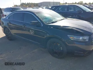 2015 Ford Taurus SEL z VIN 1FAHP2E82FG180676, wystawiony jako IAAI lot #41204450 z przebiegiem 109 022 mil mil oraz . Historia ofert i sprzedaży dostępna na DreamBid. Obrazek 1.