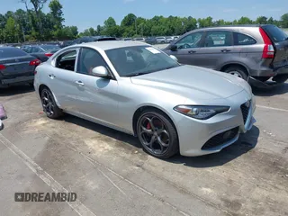2019 Alfa Romeo Giulia Ti z VIN ZARFANBN6K7609476, wystawiony jako IAAI lot #42343594 z przebiegiem 28 848 mil mil oraz . Historia ofert i sprzedaży dostępna na DreamBid. Obrazek 1.