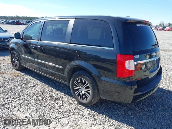 2014 Chrysler Town & Country S with VIN 2C4RC1HGXER225397, listed as a IAAI auction lot 41023867 with 180,093 mi miles and . Bid and sale history available at DreamBid. Image 3.