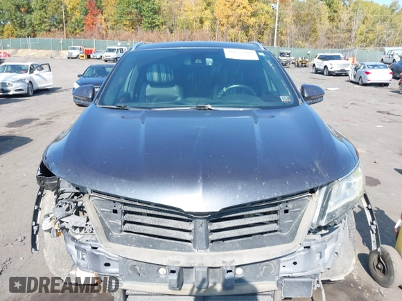 2015 Lincoln MKC with VIN 5LMCJ2A93FUJ24373, listed as a IAAI auction lot 40638009 with 127,336 mi miles. Bid and sale history available at carsss.com. Image 6.