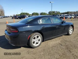 2015 Dodge Charger SE with VIN 2C3CDXBGXFH870769, listed as a Copart auction lot 53486975 with 102,323 mi miles and Salvage Title. Bid and sale history available at carsss.com. Image 3.