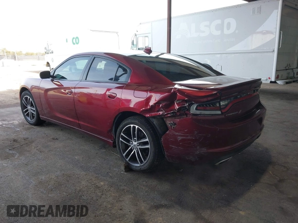 2019 Dodge Charger SXT with VIN 2C3CDXJG0KH757909, listed as a IAAI auction lot 41597907 with 71,882 mi miles and . Bid and sale history available at DreamBid. Image 3.
