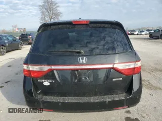 2012 Honda Odyssey Touring with VIN 5FNRL5H9XCB022284, listed as a Copart auction lot 82766824 with Not provided miles and Salvage title. Bid and sale history available at DreamBid. Image 6.