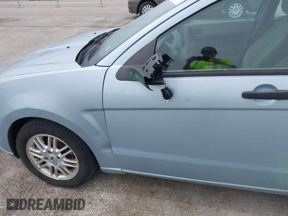 2009 Ford Focus SE with VIN 1FAHP35N59W157060, listed as a IAAI auction lot 41871757 with 141,558 mi miles. Bid and sale history available at carsss.com. Image 6.