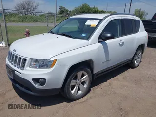 2011 Jeep Compass with VIN 1J4NT1FA3BD139578, listed as a IAAI auction lot 42058499 with 159,322 mi miles. Bid and sale history available at carsss.com. Image 2.
