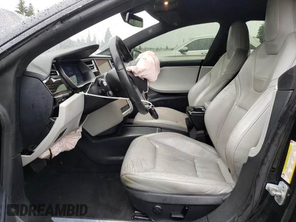 2016 Tesla Model S 70 with VIN 5YJSA1E16GF148517, listed as a Copart auction lot 52163195 with 179,172 mi miles and Salvage title. Bid and sale history available at DreamBid. Image 7.