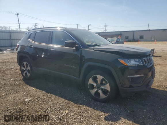 2017 Jeep Compass Latitude with VIN 3C4NJDBB3HT651453, listed as a Copart auction lot 48102715 with 69,410 mi miles and Salvage Title. Bid and sale history available at carsss.com. Image 4.