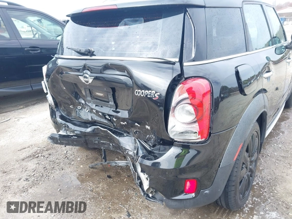 2017 MINI Countryman Cooper S with VIN WMZYT3C34H3D98585, listed as a IAAI auction lot 41752740 with 58,381 mi miles. Bid and sale history available at carsss.com. Image 18.