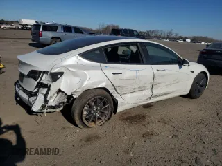 2023 Tesla Model 3 with VIN 5YJ3E1EA1PF556562, listed as a Copart auction lot 48413235 with 11,980 mi miles and Salvage Title. Bid and sale history available at DreamBid. Image 3.