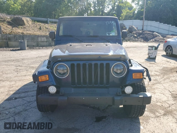 2003 Jeep Wrangler Sport z VIN 1J4FA49S13P347815, wystawiony jako Copart lot #59536685 z przebiegiem 74 298 mil mil oraz Szkoda całkowita • Salvage title. Historia ofert i sprzedaży dostępna na DreamBid. Obrazek 5.