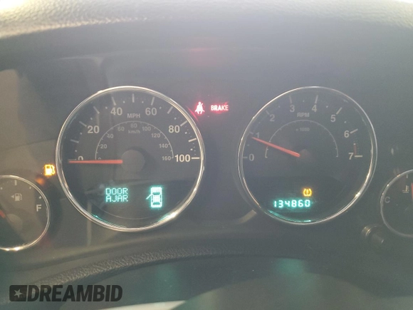 2012 Jeep Wrangler Unlimited Sport z VIN 1C4HJWDG2CL117124, wystawiony jako Copart lot #57288435 z przebiegiem 134 860 mil mil oraz Czysty tytuł • Clean title. Historia ofert i sprzedaży dostępna na DreamBid. Obrazek 9.