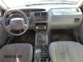 1999 Suzuki Grand Vitara JLX z VIN JS3TD62V0X4113058, wystawiony jako Copart lot #80089884 z przebiegiem 165 794 mil mil oraz Szkoda całkowita • Salvage title. Historia ofert i sprzedaży dostępna na DreamBid. Obrazek 8.