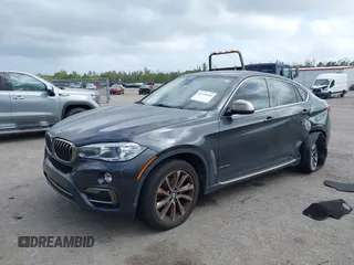 2015 BMW X6 xDrive35i z VIN 5UXKU2C59F0N76242, wystawiony jako IAAI lot #41714644 z przebiegiem 170 851 mil mil oraz . Historia ofert i sprzedaży dostępna na DreamBid. Obrazek 17.