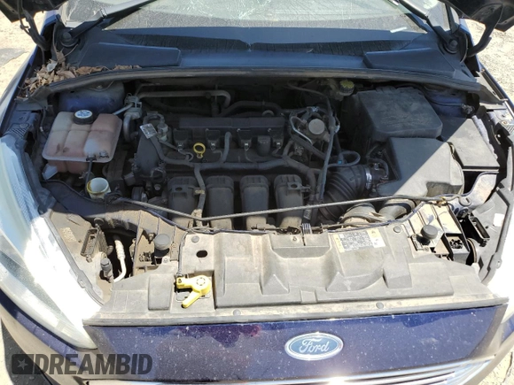 2016 Ford Focus Titanium z VIN 1FADP3J2XGL319399, wystawiony jako Copart lot #59258745 z przebiegiem 215 296 mil mil oraz Szkoda całkowita • Salvage title. Historia ofert i sprzedaży dostępna na DreamBid. Obrazek 11.