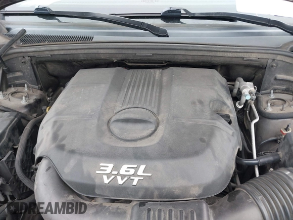 2014 Jeep Grand Cherokee Overland with VIN 1C4RJECG5EC207211, listed as a IAAI auction lot 41586309 with 115,293 mi miles. Bid and sale history available at carsss.com. Image 10.