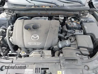2015 Mazda 3 i Touring with VIN JM1BM1L79F1218498, listed as a IAAI auction lot 41876820 with 87,602 mi miles and . Bid and sale history available at carsss.com. Image 10.
