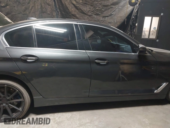 2017 BMW 5 Series 530i xDrive with VIN WBAJA7C35HG905401, listed as a IAAI auction lot 38089618 with 107,692 mi miles and . Bid and sale history available at carsss.com. Image 13.