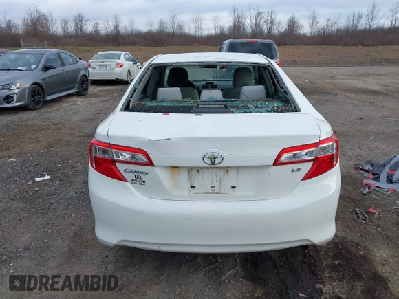 2014 Toyota Camry L with VIN 4T4BF1FKXER374901, listed as a IAAI auction lot 41861839 with 130,990 mi miles and . Bid and sale history available at DreamBid. Image 16.