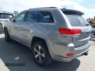 2014 Jeep Grand Cherokee Overland with VIN 1C4RJECG0EC291048, listed as a IAAI auction lot 41883941 with 81,871 mi miles. Bid and sale history available at carsss.com. Image 3.