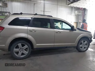 2010 Dodge Journey SXT with VIN 3D4PH5FVXAT180831, listed as a IAAI auction lot 41506328 with 155,482 mi miles. Bid and sale history available at carsss.com. Image 13.