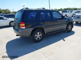 2001 Ford Escape XLT with VIN 1FMYU031X1KF31462, listed as a IAAI auction lot 41784891 with 372,527 mi miles. Bid and sale history available at carsss.com. Image 4.