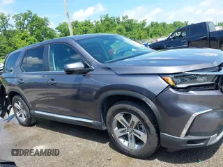 2025 Honda Pilot EX-L z VIN 5FNYG2H43SB010172, wystawiony jako IAAI lot #42262312 z przebiegiem 9 853 mil mil oraz . Historia ofert i sprzedaży dostępna na DreamBid. Obrazek 13.