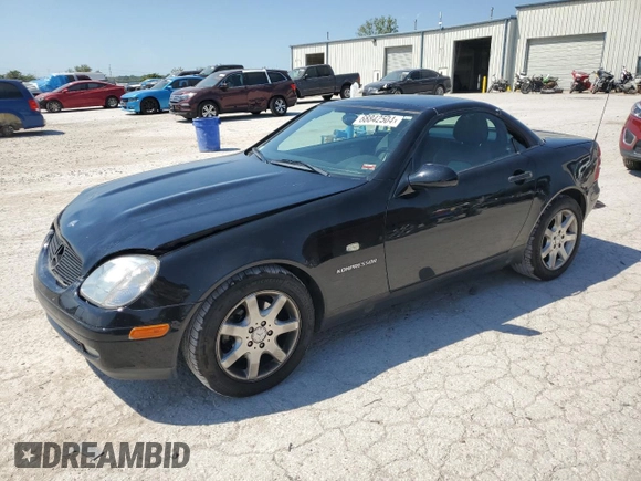 1999 Mercedes-Benz SLK-Class with VIN WDBKK47F5XF129037, listed as a Copart auction lot 68842504 with 74,397 mi miles and Salvage Title. Bid and sale history available at carsss.com. Image 1.