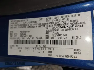 2018 Ford Fiesta SE z VIN 3FADP4BJXJM126168, wystawiony jako IAAI lot #42255261 z przebiegiem 121 248 mil mil oraz . Historia ofert i sprzedaży dostępna na DreamBid. Obrazek 9.