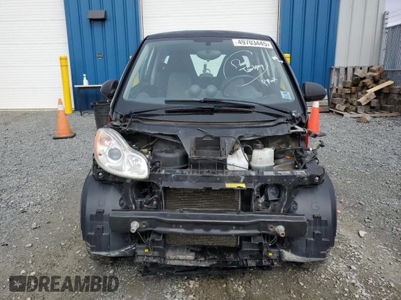 2011 Smart fortwo Pure z VIN WMEEJ3BA5BK487747, wystawiony jako Copart lot #49703445 z przebiegiem 93 489 mil mil oraz Szkoda całkowita • Salvage title. Historia ofert i sprzedaży dostępna na DreamBid. Obrazek 5.