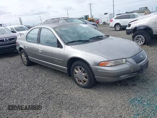 1998 Chrysler Cirrus LXi z VIN 1C3EJ56H0WN300229, wystawiony jako IAAI lot #42251263 z przebiegiem 191 491 mil mil oraz . Historia ofert i sprzedaży dostępna na DreamBid. Obrazek 1.