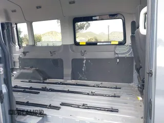 2023 Ford Transit Passenger XL with VIN 1FBAX2C82PKB58582, listed as a IAAI auction lot 41898895 with 16,416 mi miles and . Bid and sale history available at DreamBid. Image 8.