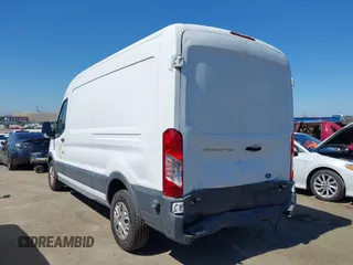 2015 Ford Transit Cargo with VIN 1FTNE2CM4FKA07886, listed as a IAAI auction lot 42446968 with 124,632 mi miles and . Bid and sale history available at DreamBid. Image 3.