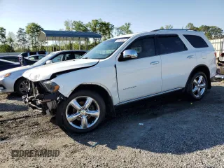 2013 Dodge Durango Citadel with VIN 1C4SDHET2DC668398, listed as a Copart auction lot 52073495 with 236,647 mi miles and Salvage Title. Bid and sale history available at carsss.com. Image 1.