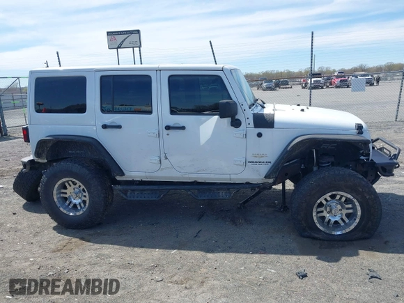 2014 Jeep Wrangler Unlimited Sahara with VIN 1C4BJWEG6EL203866, listed as a IAAI auction lot 41846091 with 105,296 mi miles. Bid and sale history available at carsss.com. Image 13.