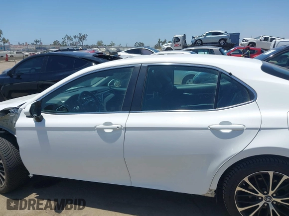 2018 Toyota Camry LE with VIN 4T1B11HK5JU007856, listed as a IAAI auction lot 42531732 with 121,020 mi miles and . Bid and sale history available at DreamBid. Image 15.