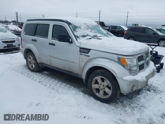 2007 Dodge Nitro SLT with VIN 1D8GU58K07W734541, listed as a IAAI auction lot 41556413 with 221,119 mi miles. Bid and sale history available at carsss.com. Image 1.