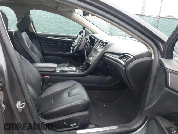 2020 Ford Fusion Titanium with VIN 3FA6P0K97LR192657, listed as a IAAI auction lot 42170258 with 87,696 mi miles and . Bid and sale history available at DreamBid. Image 5.