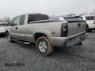 2002 Chevrolet Silverado 1500 LT with VIN 2GCEK19T821387813, listed as a Copart auction lot 50596015 with 128,739 mi miles and Salvage Title. Bid and sale history available at carsss.com. Image 2.