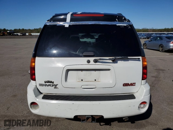 2003 GMC Envoy SLT z VIN 1GKET16S736179347, wystawiony jako Copart lot #52370775 z przebiegiem 230 623 mil mil oraz Szkoda całkowita • Salvage title. Historia ofert i sprzedaży dostępna na DreamBid. Obrazek 6.