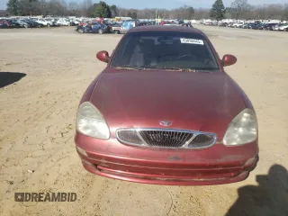 2000 Daewoo Nubira CDX z VIN KLAJB82Z7YK546648, wystawiony jako Copart lot #43050445 z przebiegiem 77 874 mil mil oraz Tytuł czysty. Historia ofert i sprzedaży dostępna na DreamBid. Obrazek 5.